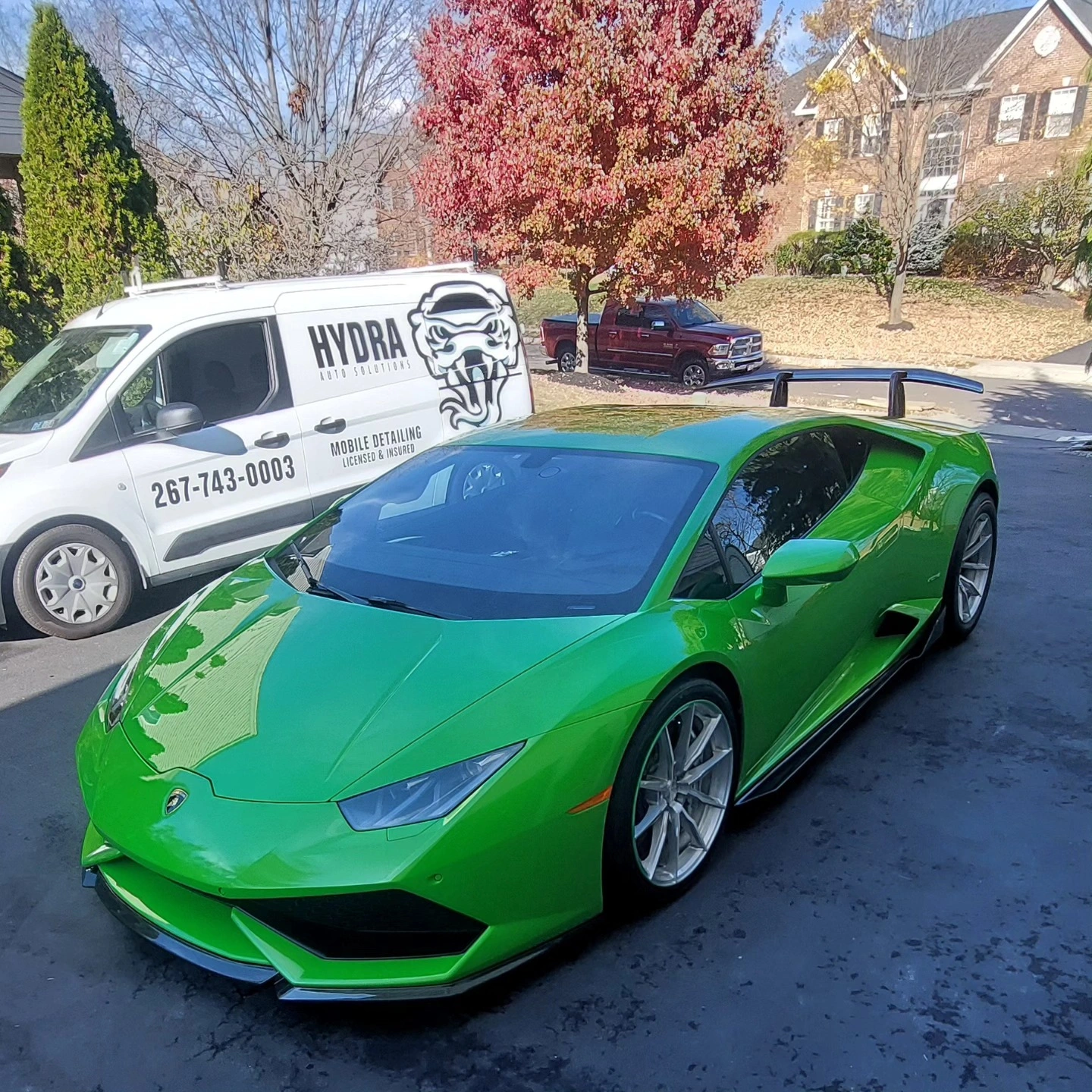 Hydra Auto Solutions branding on the mobile detailing van